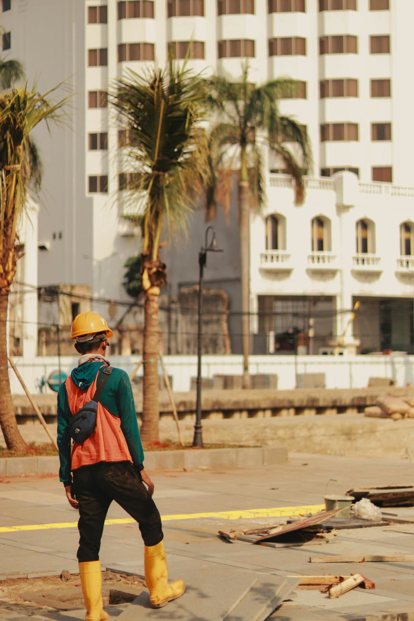 Brian Holdrick — founder, on site in hi-vis vest