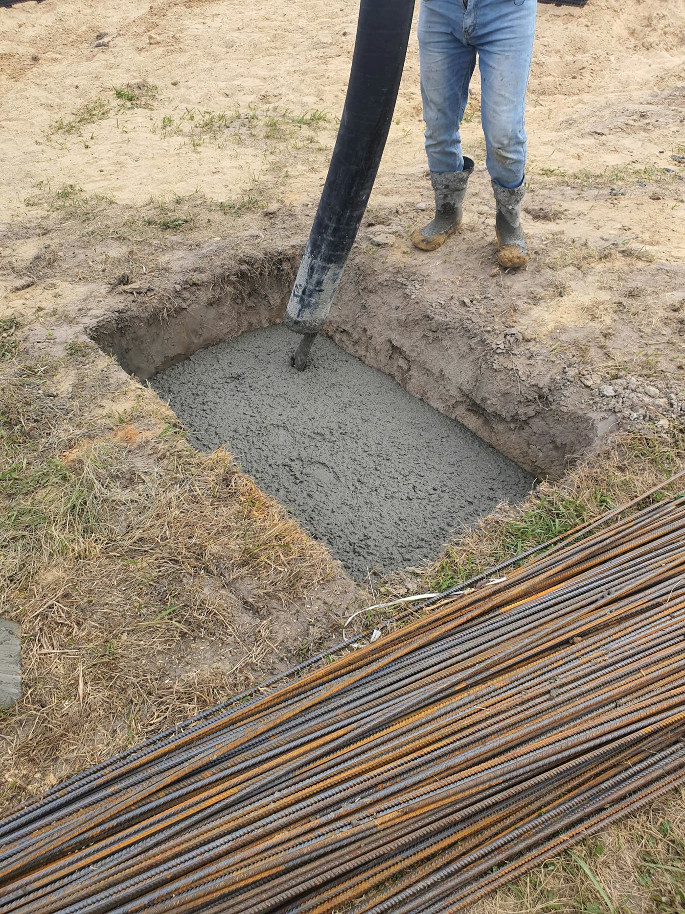 Foundation pour with rebar grid on a residential plot